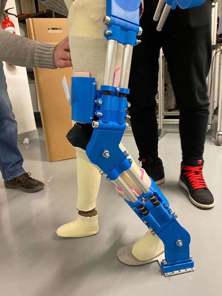 The lower half of a mannequin wearing the prototype on one leg.