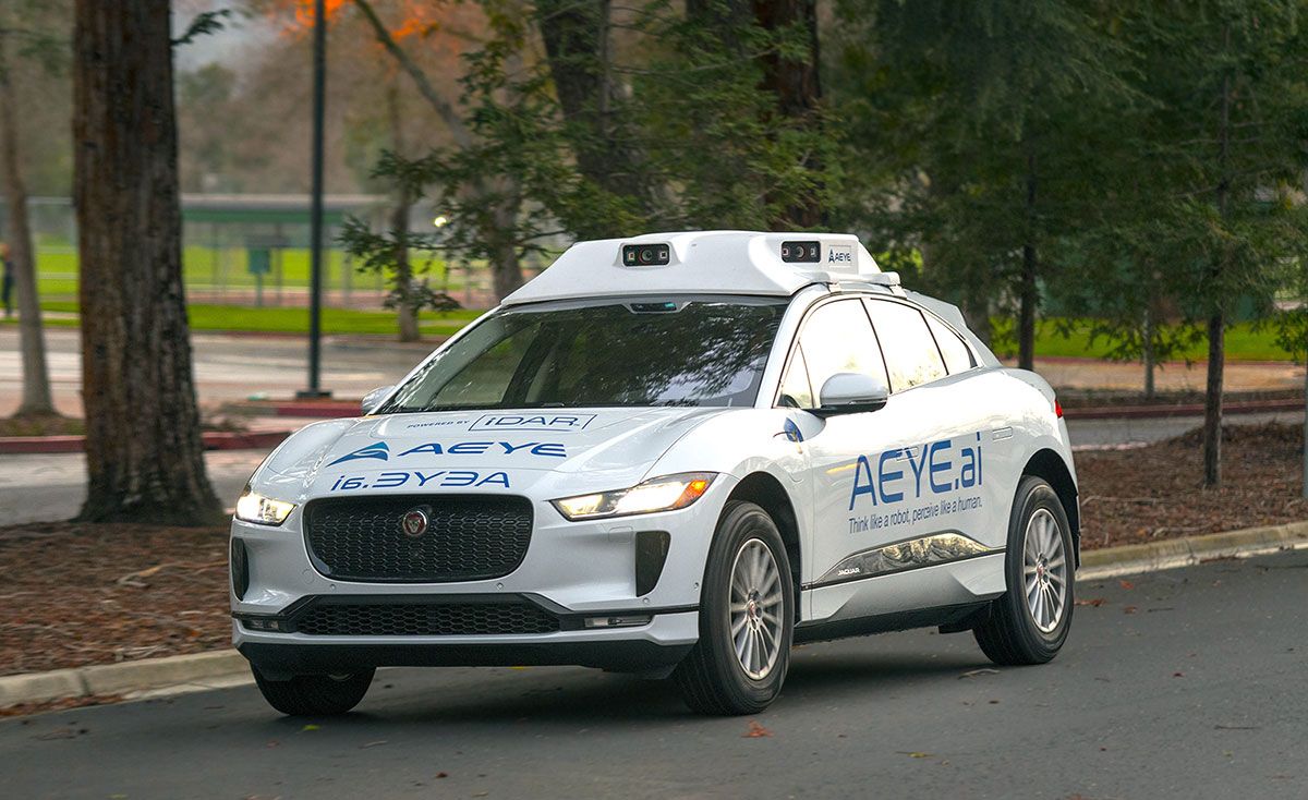 Car with iDAR system mounted on roof.