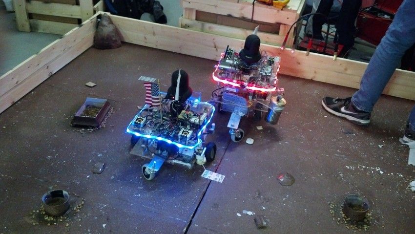 The fully autonomous robot (blue) and the remote-controlled robot (red) at the world championship