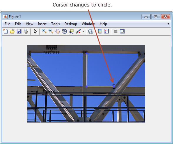 Image of crane trusses with a partially drawn polygon.