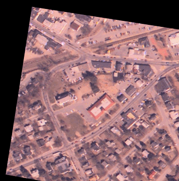 The transformed color photo appears to be captured from the same point in the sky as the grayscale orthophoto.