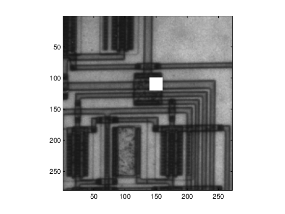 Grayscale image of a circuit with a white box replacing a portion of the original